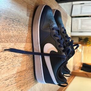 Never worn boys Nike black and blue